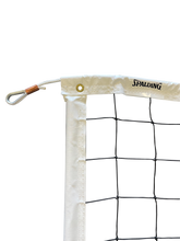 Spalding volleyball net on a white background