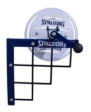 Side view of how the net winder hooks into the wall mount to store volleyball nets.